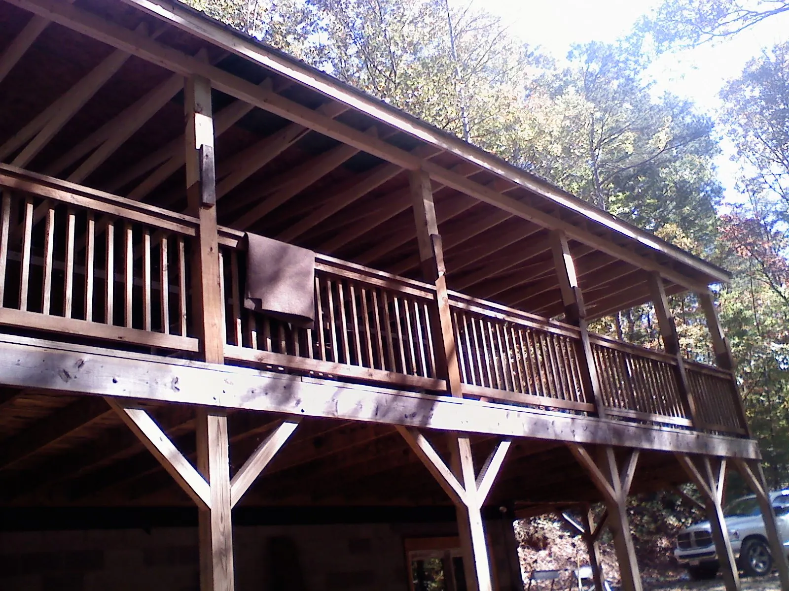 Timber framing under a new elevated porch and deck — Roof Leak Repair in Paragon by Roofing Brothers